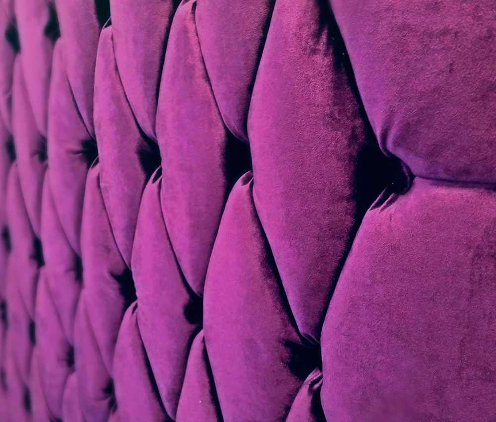 Detailed upholstered seating with deep stitched buttons